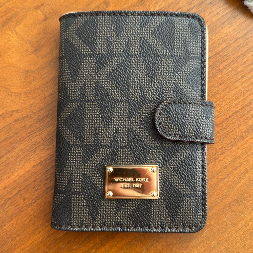 Michael Kors Bi-fold wallet passport holder with snap button